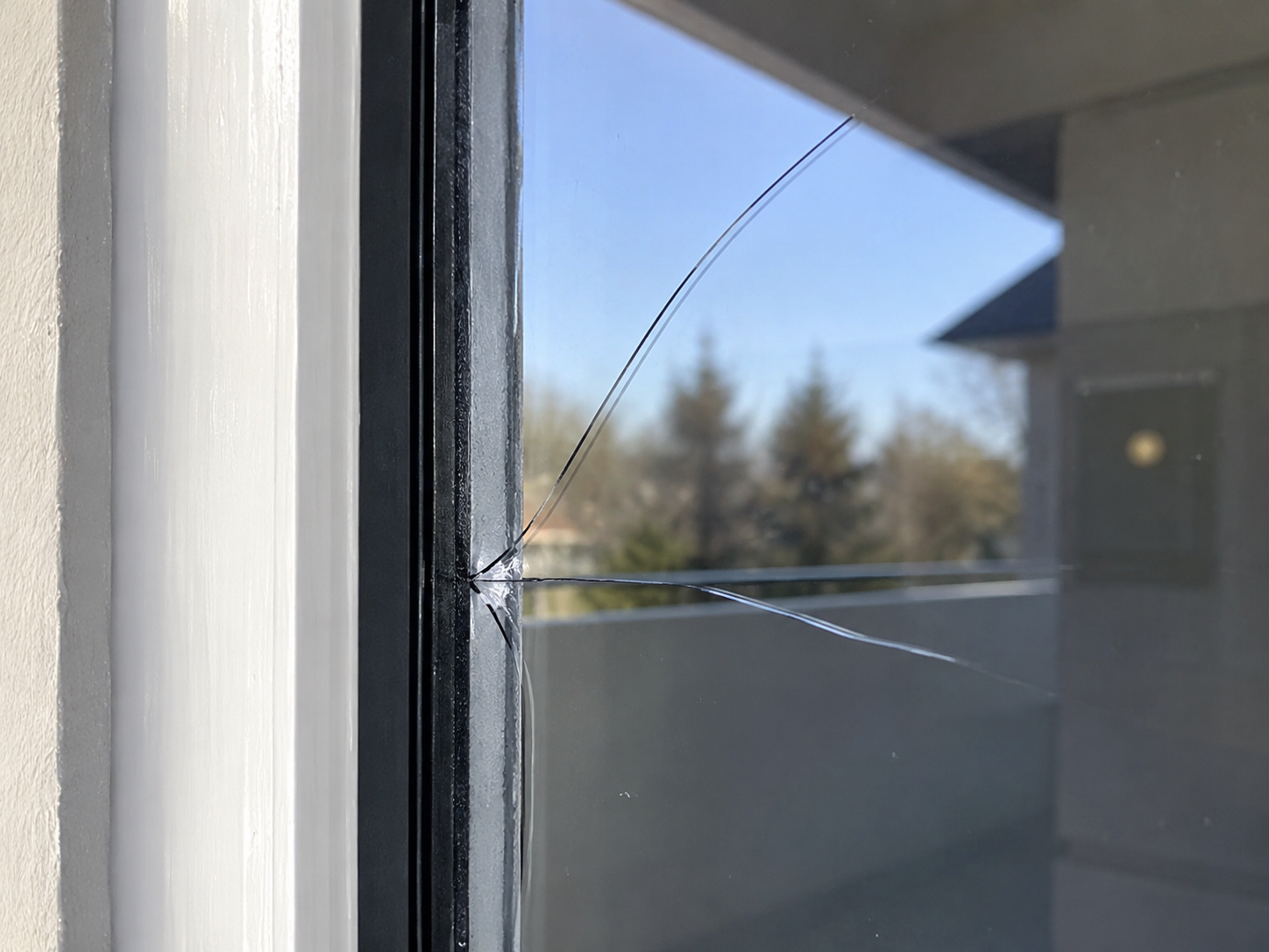 Anbes Glass and Windows Thermal stress crack in residential window glass in Edmonton